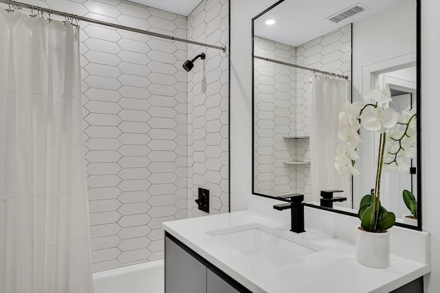 full bathroom with shower / tub combo with curtain, vanity, and recessed lighting