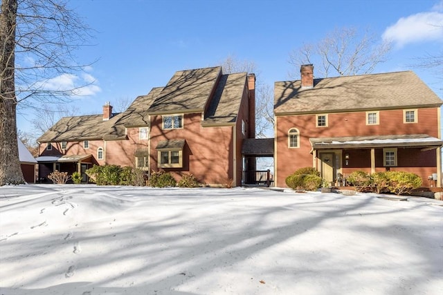 view of snow covered property