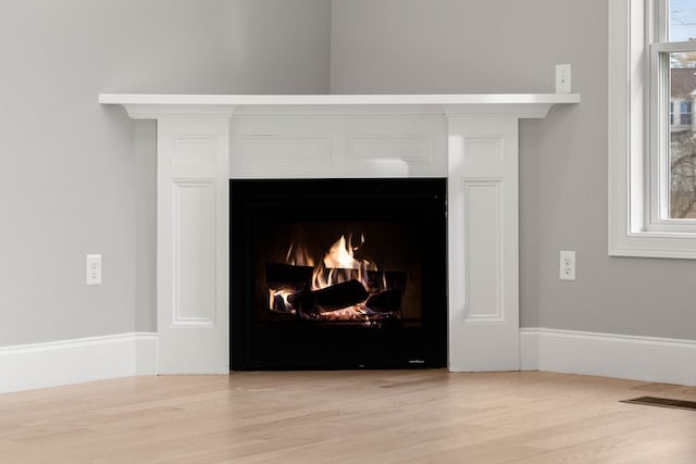 interior details featuring hardwood / wood-style floors