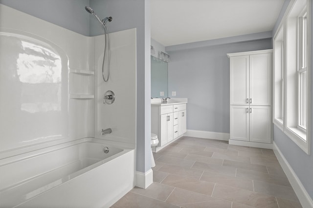 full bathroom with vanity, bathtub / shower combination, tile patterned flooring, and toilet