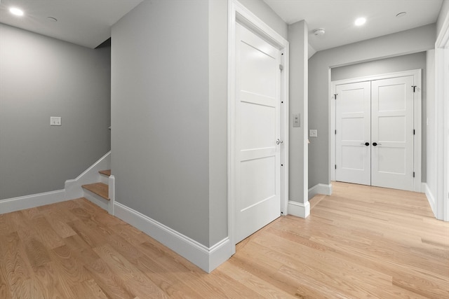 corridor featuring light hardwood / wood-style floors