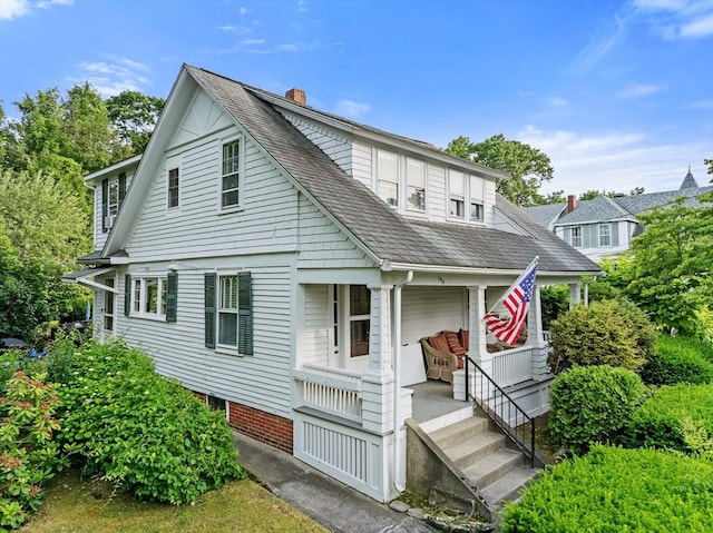 190 Winthrop St, Taunton, MA 02780 - view of front facade with covered porch, a chimney, and a shingled roof