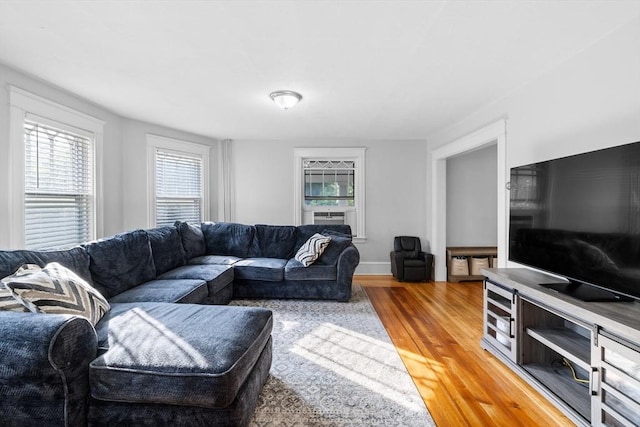 190 Winthrop St, Taunton, MA 02780 - living area featuring light wood finished floors and cooling unit