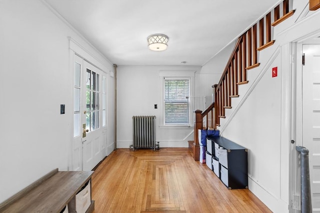 190 Winthrop St, Taunton, MA 02780 - foyer featuring radiator heating unit and stairway