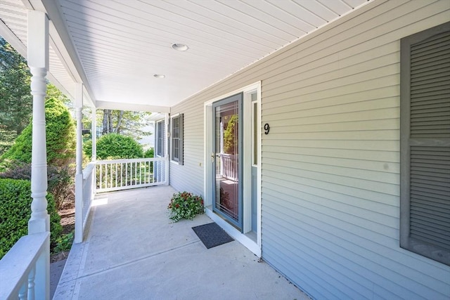 9 Lauren Ln, Southwick, MA 01077 - doorway to property with covered porch