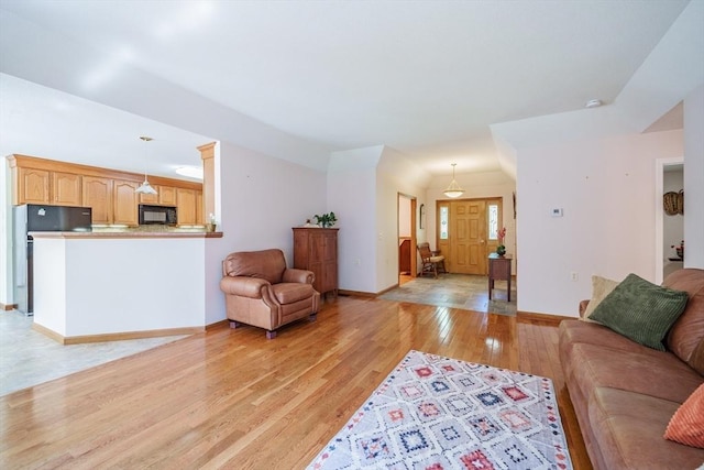 9 Lauren Ln, Southwick, MA 01077 - living area with light wood finished floors and baseboards