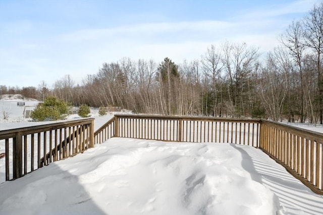 view of snow covered deck