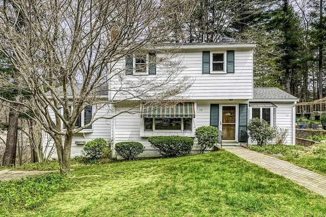 35 Wallace Rd, Wayland, MA 01778 - view of front of home featuring a front lawn