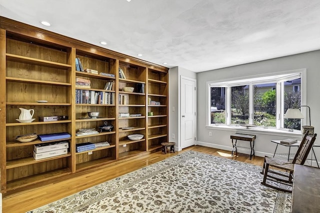 35 Wallace Rd, Wayland, MA 01778 - sitting room with recessed lighting, baseboards, and wood finished floors