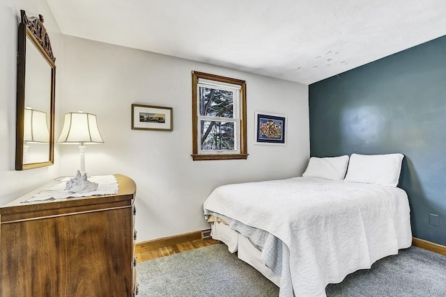 35 Wallace Rd, Wayland, MA 01778 - bedroom featuring baseboards and wood finished floors