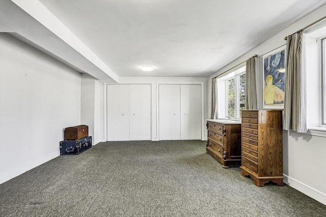 35 Wallace Rd, Wayland, MA 01778 - carpeted bedroom with baseboards and multiple closets