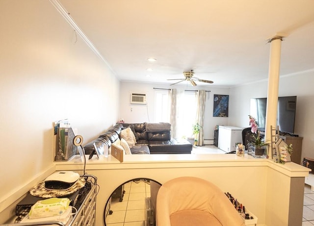 38 Carter St Unit 303, Everett, MA 02149 - tiled living area featuring ornamental molding, a baseboard heating unit, a wall mounted AC, and ceiling fan