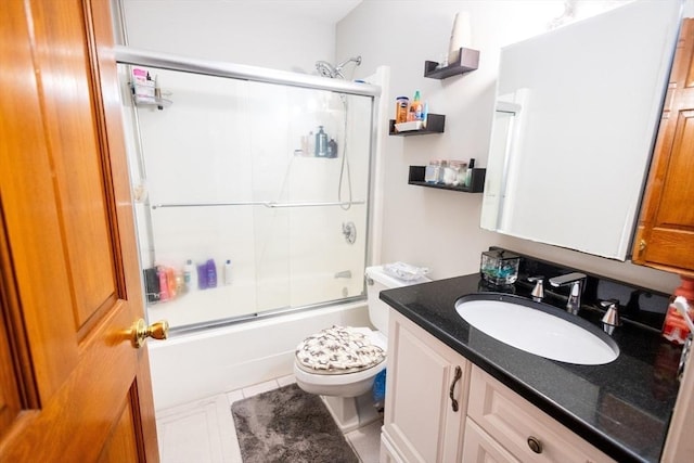 38 Carter St Unit 303, Everett, MA 02149 - bathroom featuring vanity, shower / bath combination with glass door, and tile patterned floors