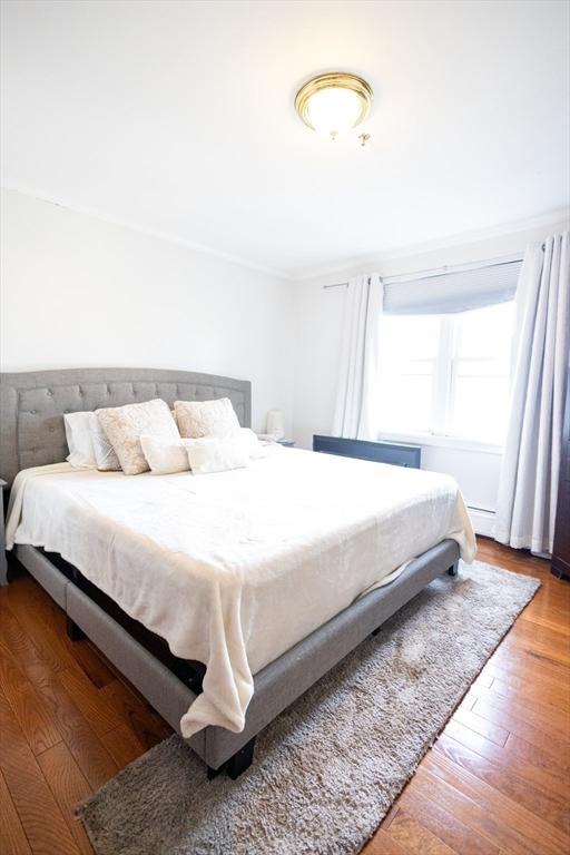 38 Carter St Unit 303, Everett, MA 02149 - bedroom with hardwood / wood-style flooring