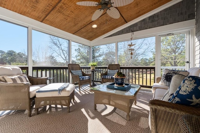 sunroom featuring ceiling fan, lofted ceiling, and wood ceiling