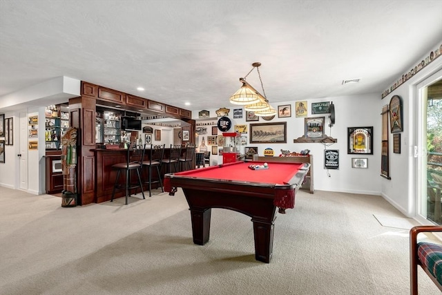 playroom with light colored carpet, indoor bar, and billiards