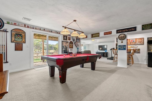 playroom featuring light colored carpet, bar, and pool table