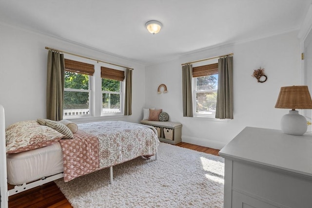 614 Summer St, Arlington, MA 02474 - bedroom with wood finished floors and crown molding