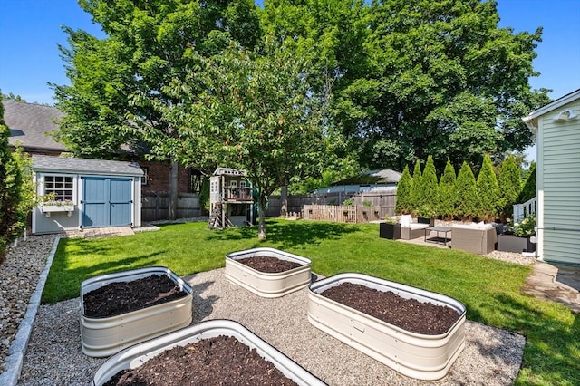 614 Summer St, Arlington, MA 02474 - fenced backyard featuring an outdoor living space, a garden, and a storage shed