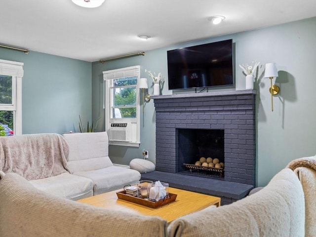 168 Maple St, Boston, MA 02132 - living room featuring cooling unit and a brick fireplace