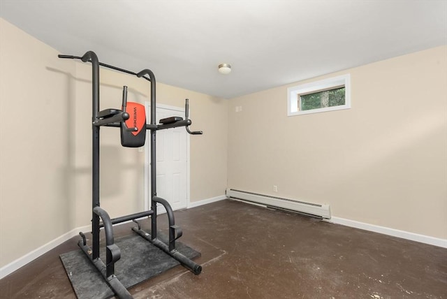 workout area with a baseboard heating unit and baseboards