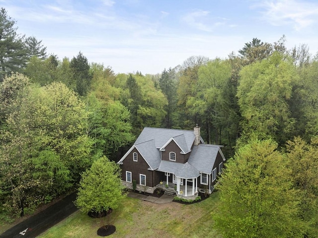 aerial view with a wooded view