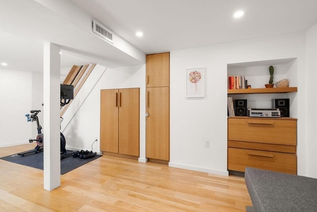 68 Cliftondale St, Boston, MA 02131 - exercise area with light wood finished floors, recessed lighting, and baseboards