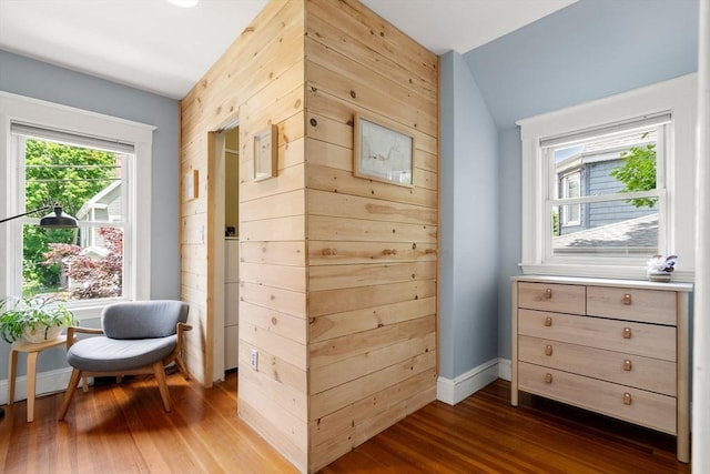 68 Cliftondale St, Boston, MA 02131 - sitting room featuring dark wood-style flooring, baseboards, and lofted ceiling