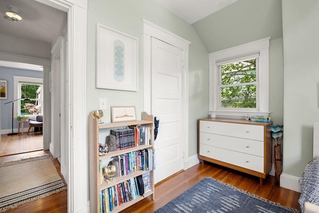 68 Cliftondale St, Boston, MA 02131 - sitting room featuring wood finished floors, healthy amount of natural light, baseboards, and vaulted ceiling