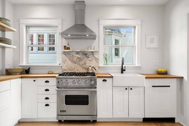68 Cliftondale St, Boston, MA 02131 - kitchen featuring premium range, wood counters, open shelves, and wall chimney range hood