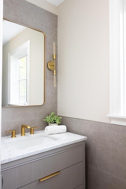 15 Woodcliff Rd, Newton, MA 02461 - bathroom with vanity and tile walls