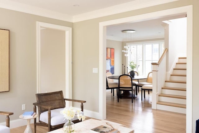 15 Woodcliff Rd, Newton, MA 02461 - living area with light wood-style floors, stairway, baseboards, and crown molding