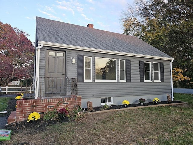 view of front of home with a front yard