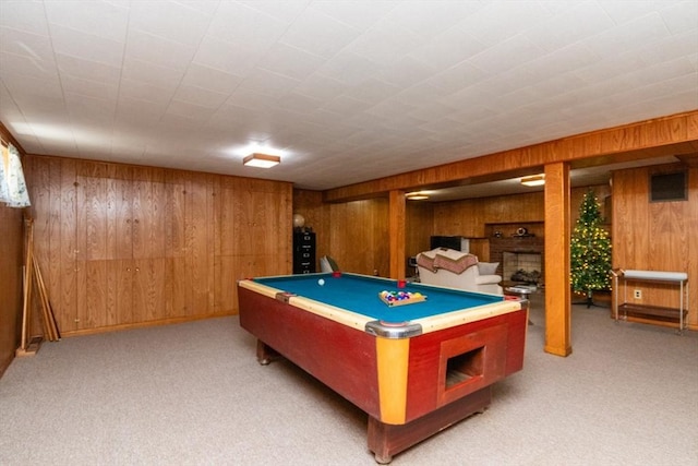 rec room with wooden walls, light carpet, and billiards