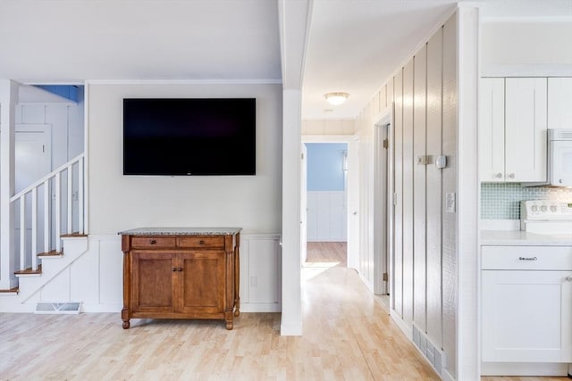 hallway featuring light wood-type flooring