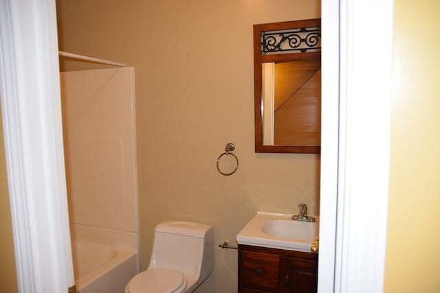 full bathroom with vanity, shower / bathtub combination, and toilet