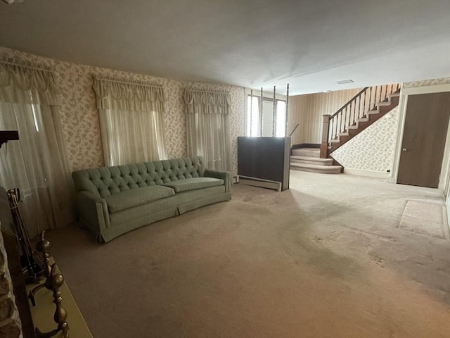 unfurnished living room featuring carpet