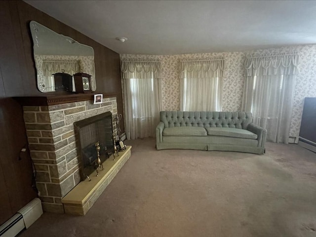 unfurnished living room featuring carpet, a fireplace, plenty of natural light, and a baseboard radiator