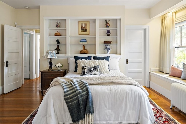 6 Francis Circuit Unit 6, Winchester, MA 01890 - bedroom with radiator heating unit, wood finished floors, and baseboards