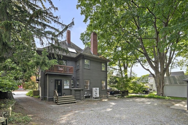 6 Francis Circuit Unit 6, Winchester, MA 01890 - back of house featuring a balcony and a chimney