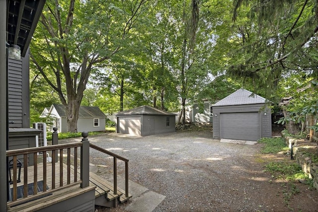 6 Francis Circuit Unit 6, Winchester, MA 01890 - detached garage featuring view of scattered trees