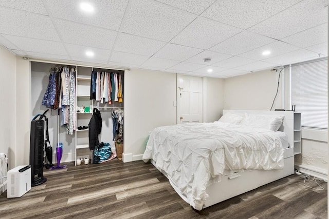126 W Wyoming Ave, Melrose, MA 02176 - bedroom with a closet, wood finished floors, baseboards, a drop ceiling, and recessed lighting