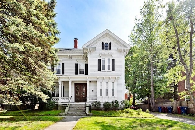 126 W Wyoming Ave, Melrose, MA 02176 - italianate house with covered porch and a chimney