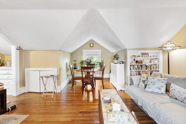126 W Wyoming Ave, Melrose, MA 02176 - living area with lofted ceiling and wood finished floors