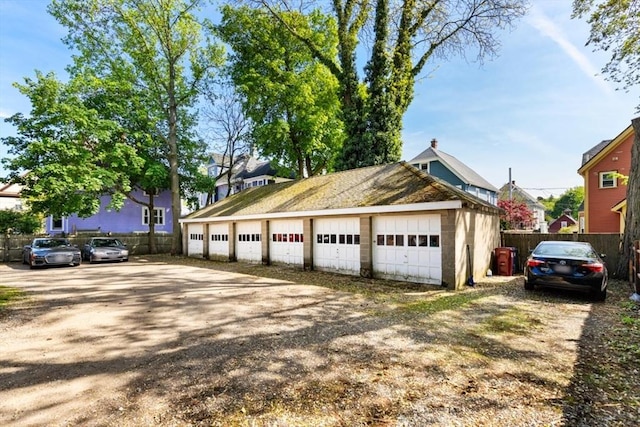 126 W Wyoming Ave, Melrose, MA 02176 - garage featuring fence and driveway