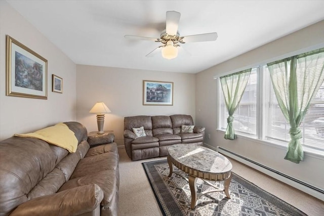 living room featuring carpet floors, a baseboard radiator, and ceiling fan