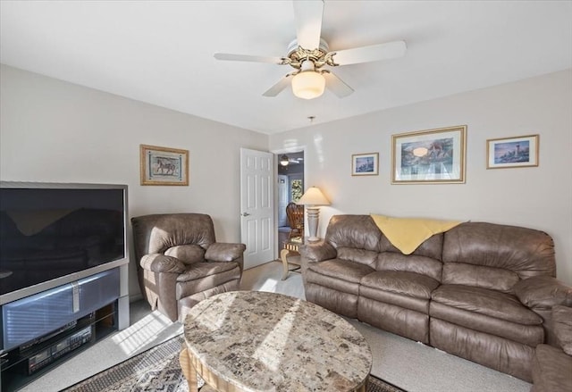 living room featuring ceiling fan