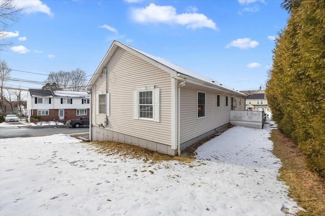 view of snow covered property