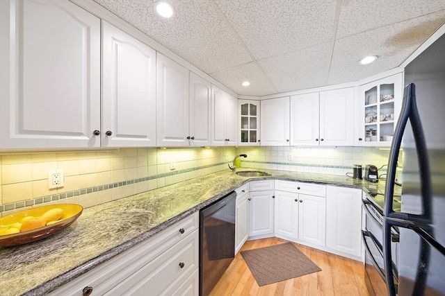 61 Broad Reach Unit T62B, Weymouth, MA 02191 - kitchen with black appliances, a sink, stone counters, white cabinetry, and recessed lighting
