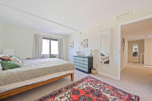 61 Broad Reach Unit T62B, Weymouth, MA 02191 - bedroom with carpet flooring, a textured ceiling, and baseboards